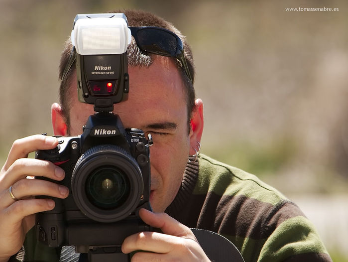 Fotógrafo fotografiando